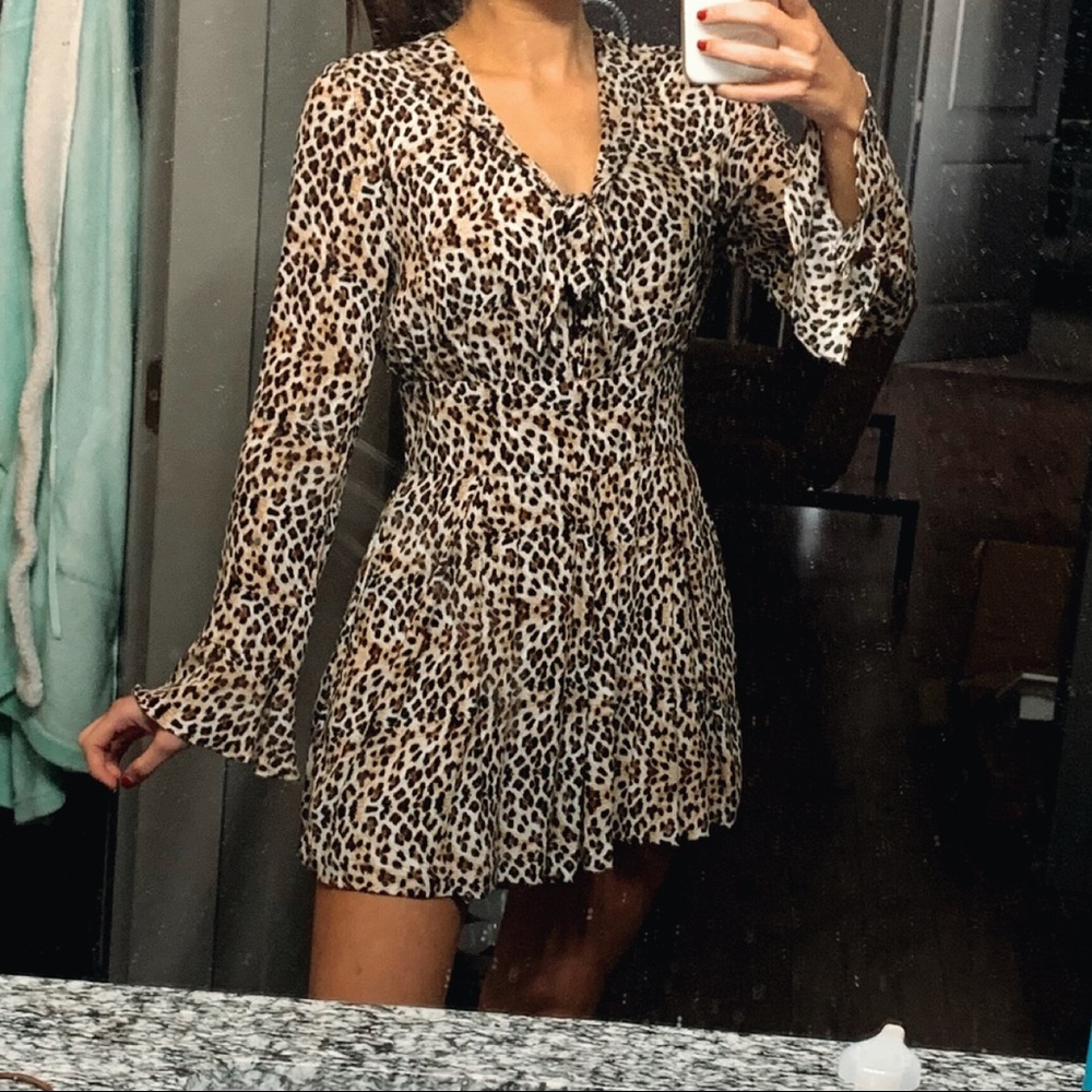 Long sleeve flirty cheetah print romper